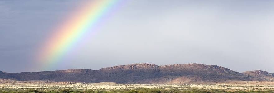 beautiful rainbow over a river valley